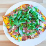 Sunrise Slice: Breakfast Pizza with Soft Eggs & Arugula