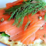Delight in Smoked Salmon Flatbread with Zesty Dill Cream