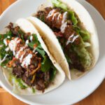 Fusion Feast: Gochujang Beef Bulgogi Tacos with Kimchi Slaw