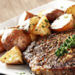 Sizzling Garlic Butter Steak Bites with Crispy Potatoes Delight